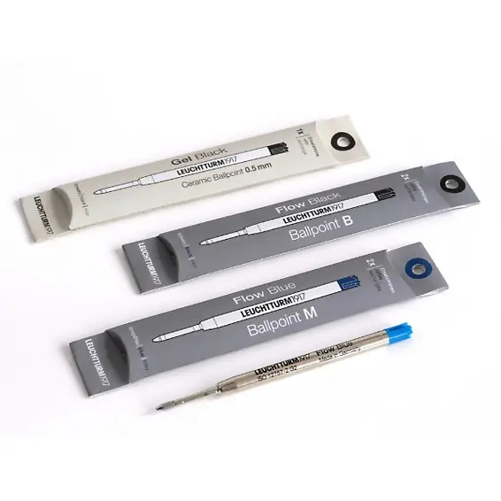 Drehgriffel Minen Gel und Ballpoint. Three LEUCHTTURM1917 refills: Gel Black, Ballpoint B and Ballpoint M, with packaging and blue refill.